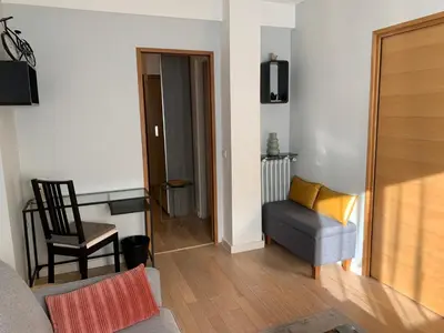 Coin salon dans l'établissement Appartement cosy - Paris La Défense
