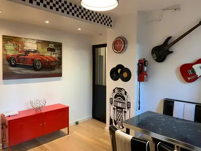 Coin salon dans l'établissement Appartement cosy - Paris La Défense