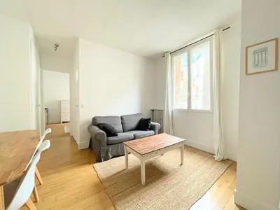Coin salon dans l'établissement Charming Apartment, Paris Centre