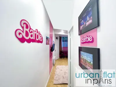 Télévision ou salle de divertissement dans l'établissement Urban Flat 193 - Barbie in Paris