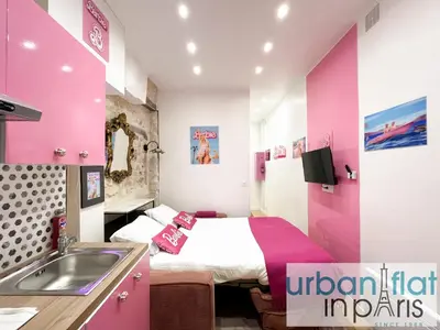 Un ou plusieurs lits dans un hébergement de l'établissement Urban Flat 193 - Barbie in Paris