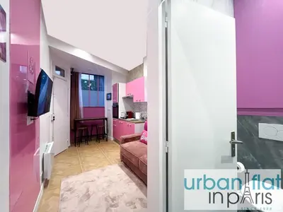Télévision ou salle de divertissement dans l'établissement Urban Flat 193 - Barbie in Paris
