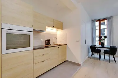 Cuisine ou kitchenette dans l'établissement Boutiques Apartments Paris