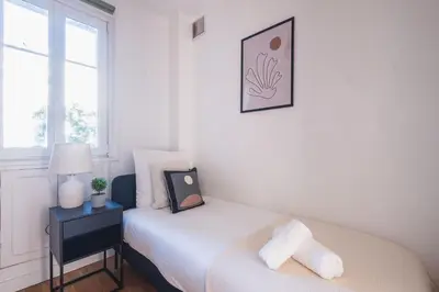 Un ou plusieurs lits dans un hébergement de l'établissement Logement Haut de Gamme à Grenelle
