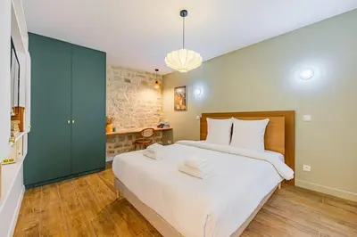 Un ou plusieurs lits dans un hébergement de l'établissement Lovely Flat-4 Pers-Sacré Cœur-Montmartre
