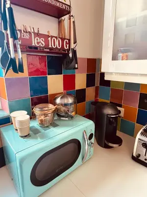 Cuisine ou kitchenette dans l'établissement Le Refuge Bohème
