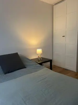Un ou plusieurs lits dans un hébergement de l'établissement Studio Buttes Chaumont refait à neuf