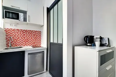 Cuisine ou kitchenette dans l'établissement Studio paisible Paris 10ème - Canal St Martin