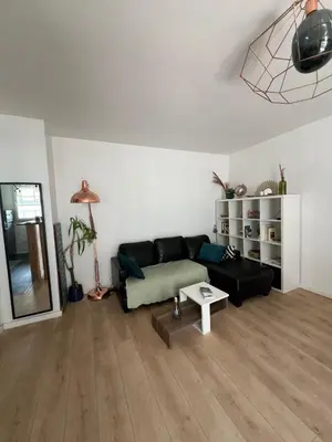Coin salon dans l'établissement Chic & Spacieux-Paris à porte-Au pied du Métro 14