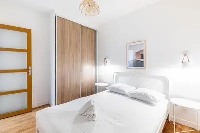 Un ou plusieurs lits dans un hébergement de l'établissement GuestReady - Cozy Parisian Escape for 2