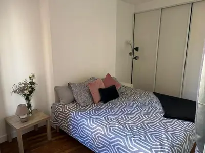 Un ou plusieurs lits dans un hébergement de l'établissement Cosy Haven Paris 14