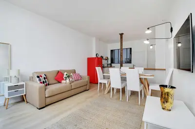 Coin salon dans l'établissement Loft d'Exception pour 6 Personnes - Voltaire 11e