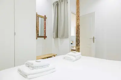 Un ou plusieurs lits dans un hébergement de l'établissement Loft Moderne et Spacieux - 6 Couchages Voltaire 11
