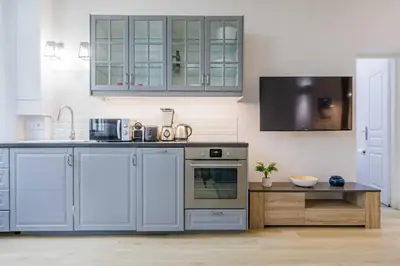 Cuisine ou kitchenette dans l'établissement Loft Moderne et Spacieux - 6 Couchages Voltaire 11