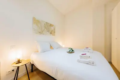 Un ou plusieurs lits dans un hébergement de l'établissement Loft Lumineux et Design - 6 Personnes Voltaire 11e