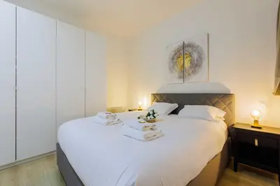 Un ou plusieurs lits dans un hébergement de l'établissement Loft Lumineux et Design - 6 Personnes Voltaire 11e
