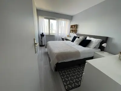 Un ou plusieurs lits dans un hébergement de l'établissement Chic Parisian Sacre Coeur views