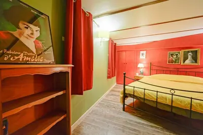 Un ou plusieurs lits dans un hébergement de l'établissement Amelie in Paris