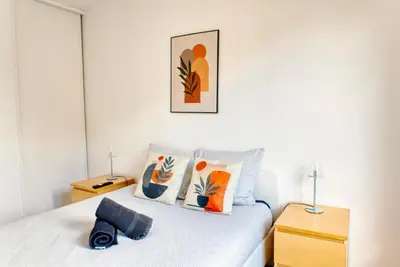 Un ou plusieurs lits dans un hébergement de l'établissement Appartement cosy parking privé