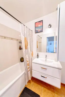 Salle de bains dans l'établissement Appartement cosy parking privé