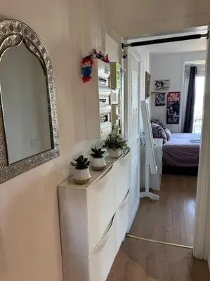 Un ou plusieurs lits dans un hébergement de l'établissement Appartement sous le toits de Paris