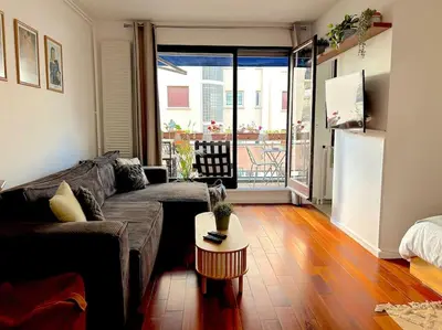 Coin salon dans l'établissement Apartment with Terrace near Parc Des Princes Stadium in 16th arr in Paris