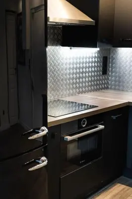 Cuisine ou kitchenette dans l'établissement Appartement Place des Vosges, Marais Bastille