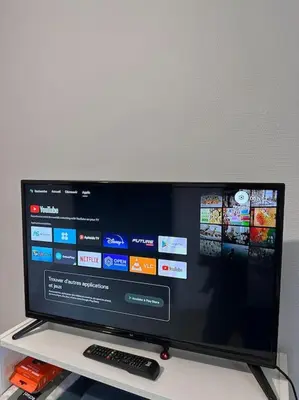 Télévision ou salle de divertissement dans l'établissement Bohemian cosy flat