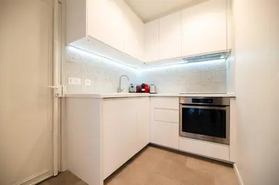 Cuisine ou kitchenette dans l'établissement Elegant apartment - 2BR - 6P - Notre Dame Cathedral