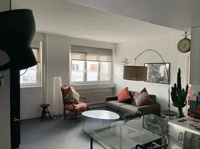 Coin salon dans l'établissement Paris 16e arrondissement superbe 45 m2 plein sud