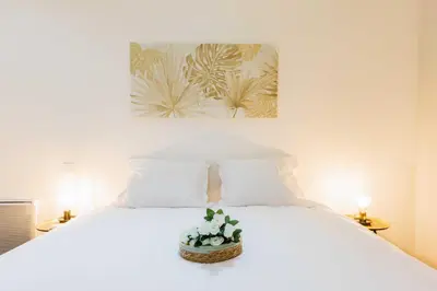 Un ou plusieurs lits dans un hébergement de l'établissement Loft Épuré et Confortable - 6 Pers Voltaire - 11e