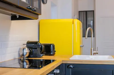 Cuisine ou kitchenette dans l'établissement Loft Épuré et Confortable - 6 Pers Voltaire - 11e