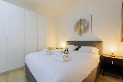 Un ou plusieurs lits dans un hébergement de l'établissement Loft Épuré et Confortable - 6 Pers Voltaire - 11e