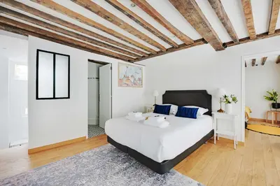 Un ou plusieurs lits dans un hébergement de l'établissement Duplex pour 6 a Republique Confort et Centralite