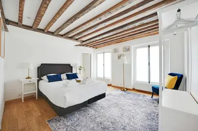Un ou plusieurs lits dans un hébergement de l'établissement Duplex pour 6 a Republique Confort et Centralite