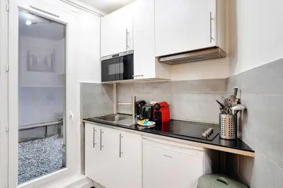 Cuisine ou kitchenette dans l'établissement Confort et Charme pour 6 à Republioque