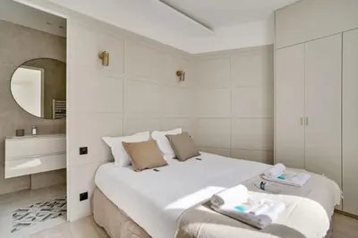 Un ou plusieurs lits dans un hébergement de l'établissement Sublime Paris apartment 3Br-10P
