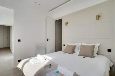 Un ou plusieurs lits dans un hébergement de l'établissement Sublime Paris apartment 3Br-10P