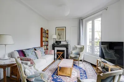 Coin salon dans l'établissement Bel appartement parisien - Les Gobelins