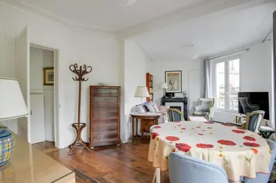 Télévision ou salle de divertissement dans l'établissement Bel appartement parisien - Les Gobelins