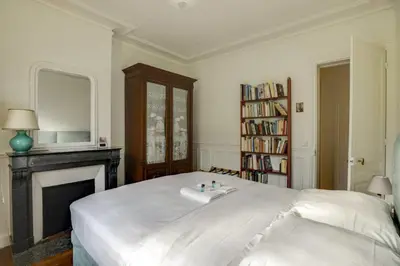 Un ou plusieurs lits dans un hébergement de l'établissement Bel appartement parisien - Les Gobelins