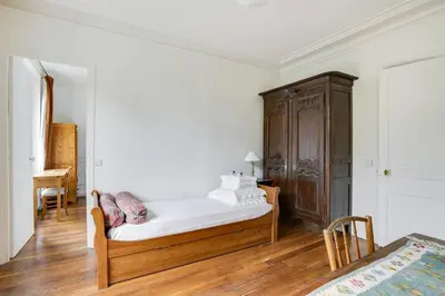 Un ou plusieurs lits dans un hébergement de l'établissement Bel appartement parisien - Les Gobelins