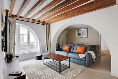 Coin salon dans l'établissement Cozy apartment - 1BR-4P - Les Halles