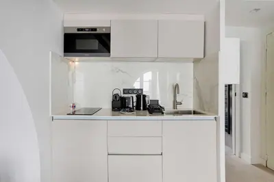 Cuisine ou kitchenette dans l'établissement Cozy apartment - 1BR-4P - Les Halles