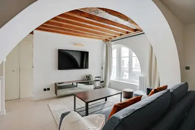 Télévision ou salle de divertissement dans l'établissement Cozy apartment - 1BR-4P - Les Halles