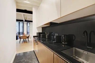 Cuisine ou kitchenette dans l'établissement Pick A Flat's Apartment in Palais Royal - Rue de Richelieu