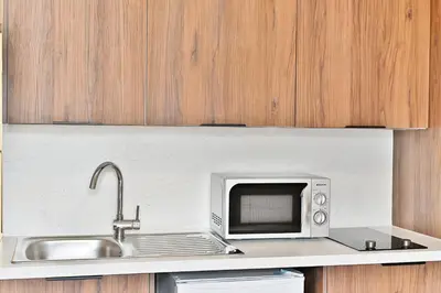 Cuisine ou kitchenette dans l'établissement Studio central Opéra Garnier -Paris - II
