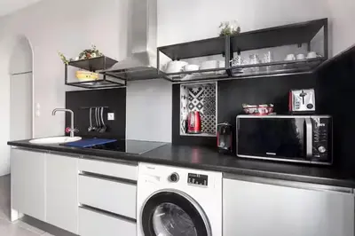 Cuisine ou kitchenette dans l'établissement Mon Logis