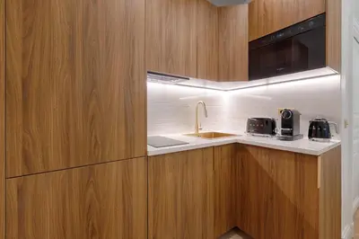 Cuisine ou kitchenette dans l'établissement Charming Pied-à-Terre Champs-Élysée