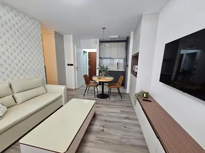 Télévision ou salle de divertissement dans l'établissement apt cosy proche arena bercy